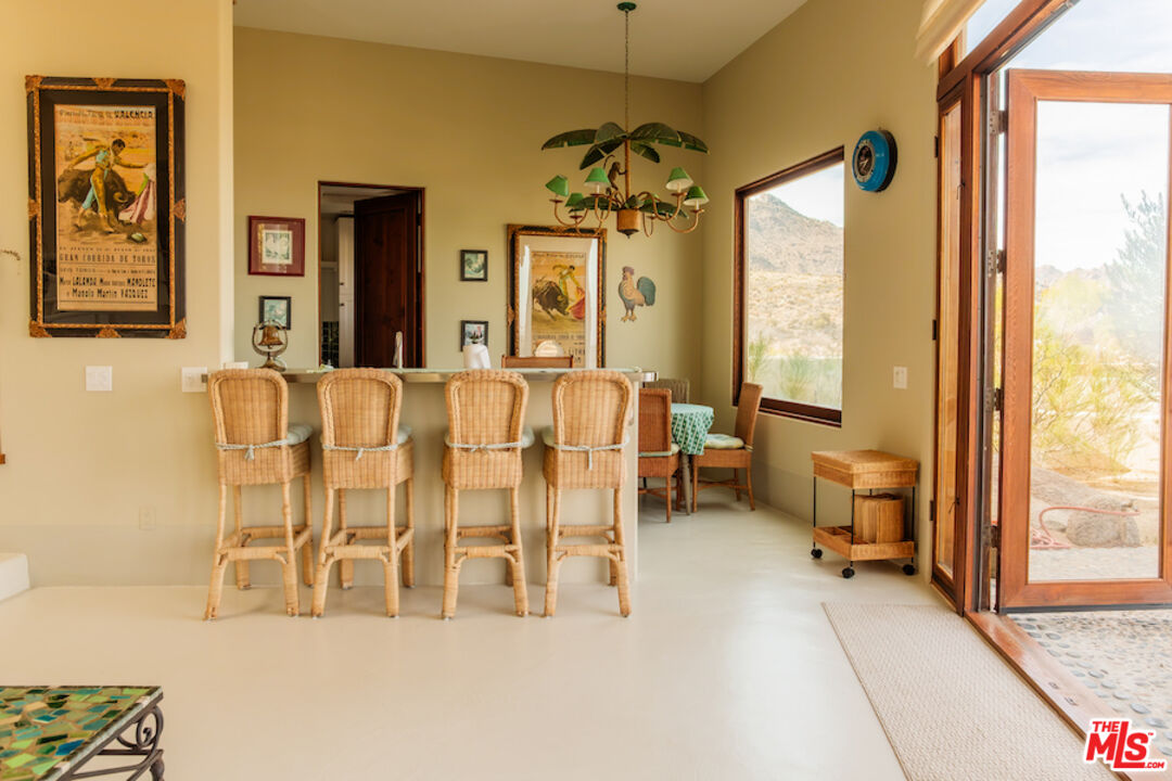 57425 Palm Seco Circle Mountain Center, CA 92561 - Photo 50 of 61 a living room with furniture and a large window