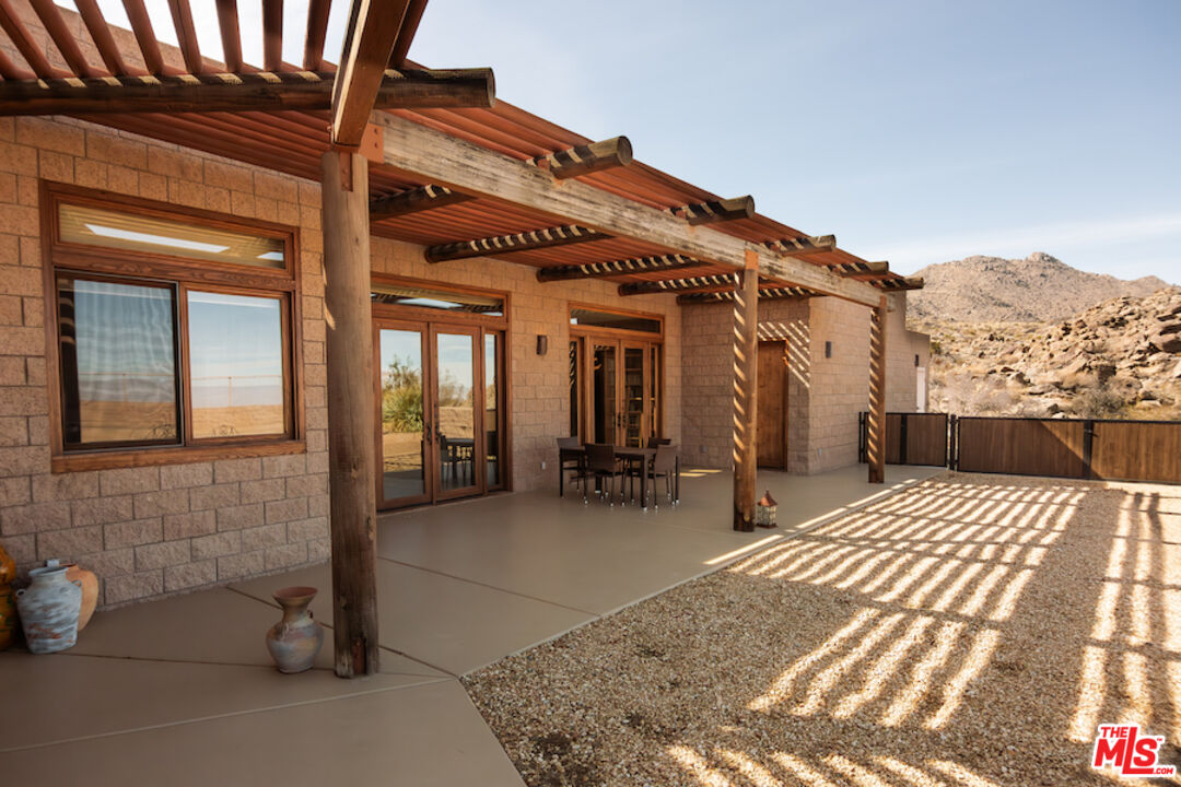57425 Palm Seco Circle Mountain Center, CA 92561 - Photo 54 of 61 a view of a house with a patio