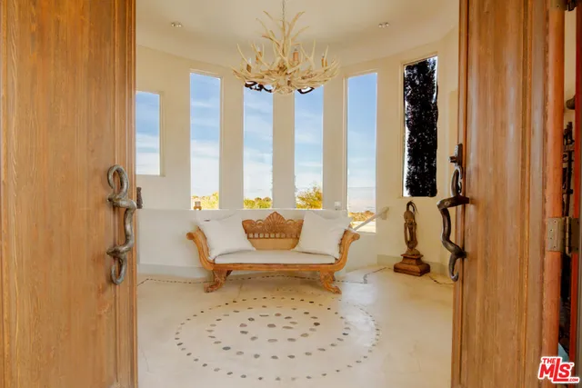 a living room with furniture and a table