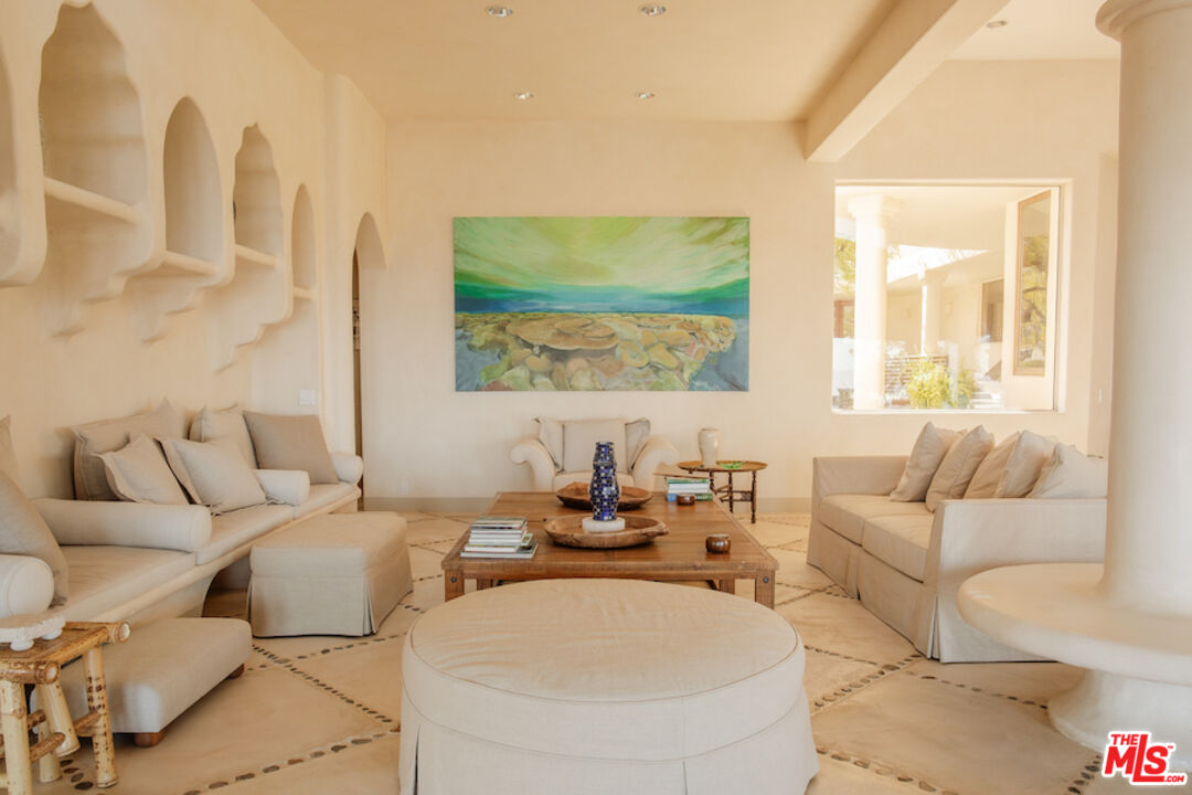 57425 Palm Seco Circle Mountain Center, CA 92561 - Photo 10 of 61 a living room with furniture and a large window