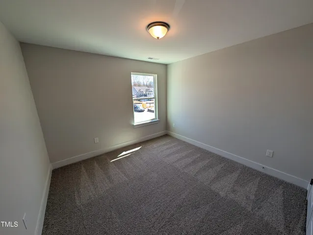 a bathroom with a sink a toilet a shower and a mirror