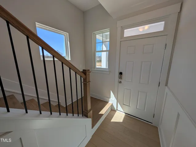 a view of a stairs and an entryway