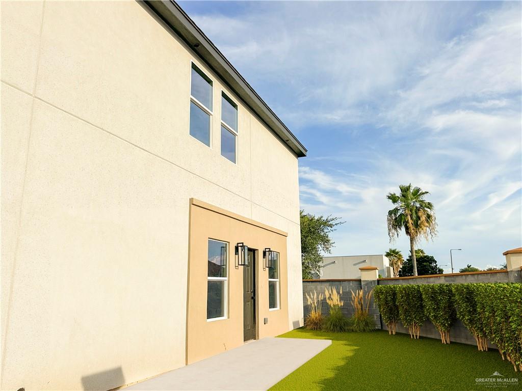4801 Tyler Avenue, Unit 2 McAllen, TX 78503 - Photo 2 of 19 a house view with a garden space
