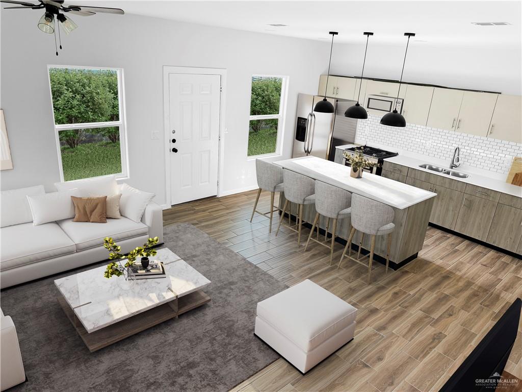 4801 Tyler Avenue, Unit 2 McAllen, TX 78503 - Photo 3 of 19 a living room with furniture and a window