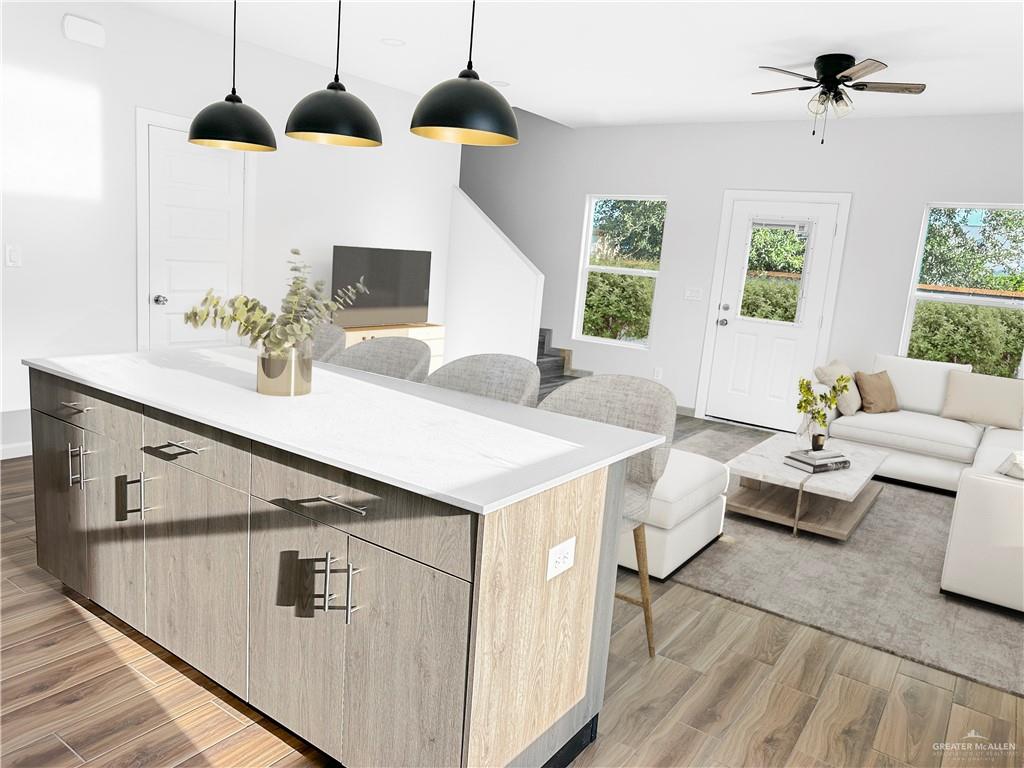 4801 Tyler Avenue, Unit 2 McAllen, TX 78503 - Photo 6 of 19 a living room with furniture and a flat screen tv