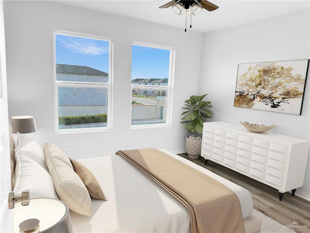 4801 Tyler Avenue, Unit 2 McAllen, TX 78503 - Photo 9 of 19 a bedroom with bed and a window