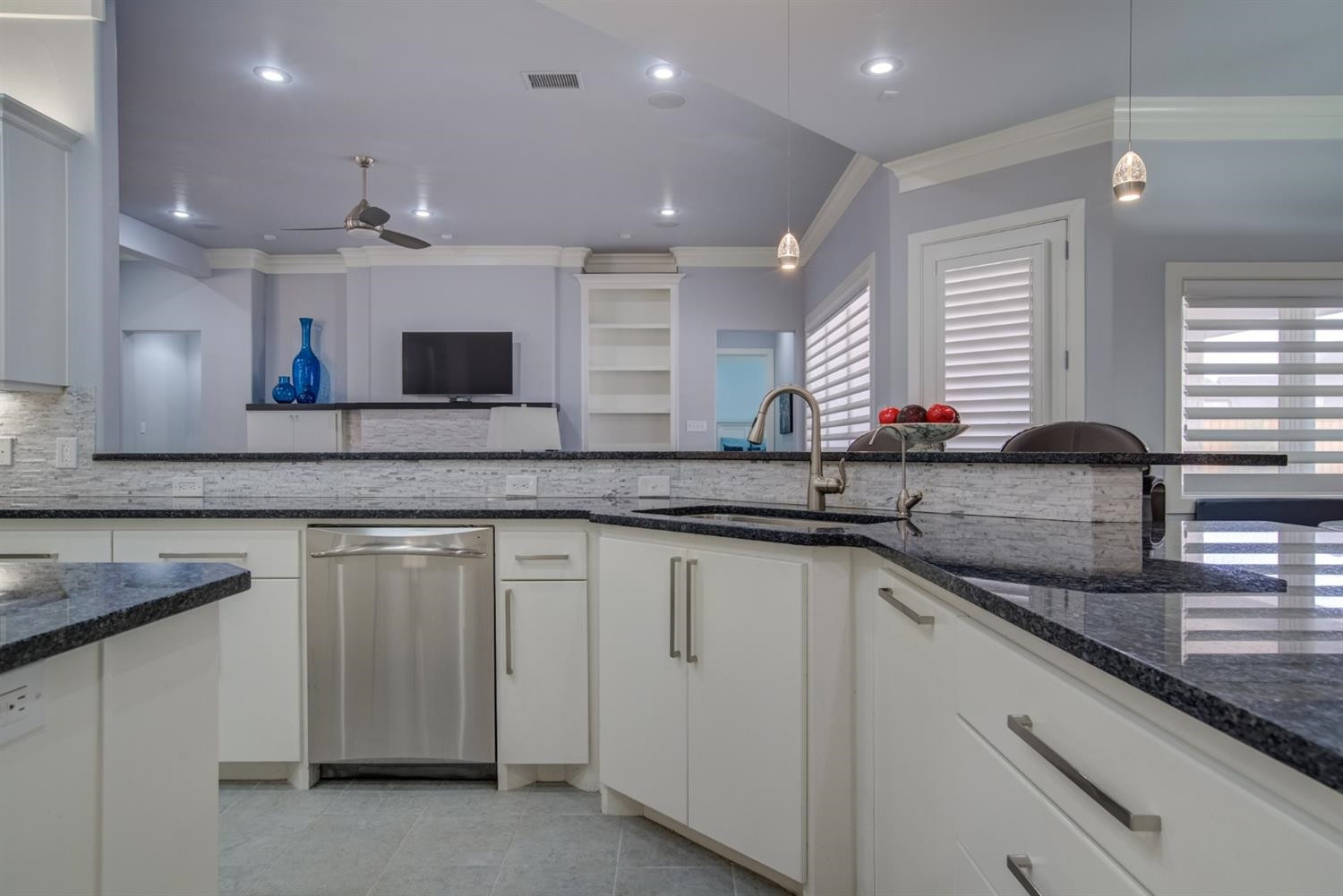 4002 113th Street Lubbock, TX 79423 - Photo 15 of 50 a kitchen with lots of counter space and a sink
