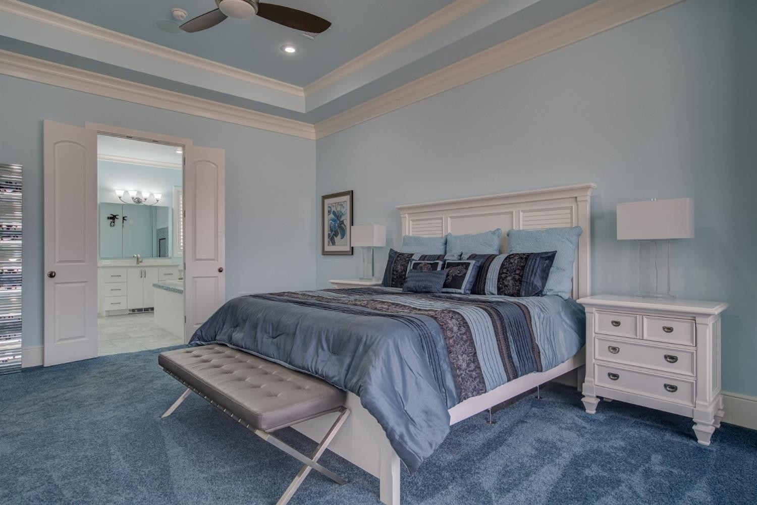 4002 113th Street Lubbock, TX 79423 - Photo 23 of 50 a spacious bedroom with a bed and a view of living room