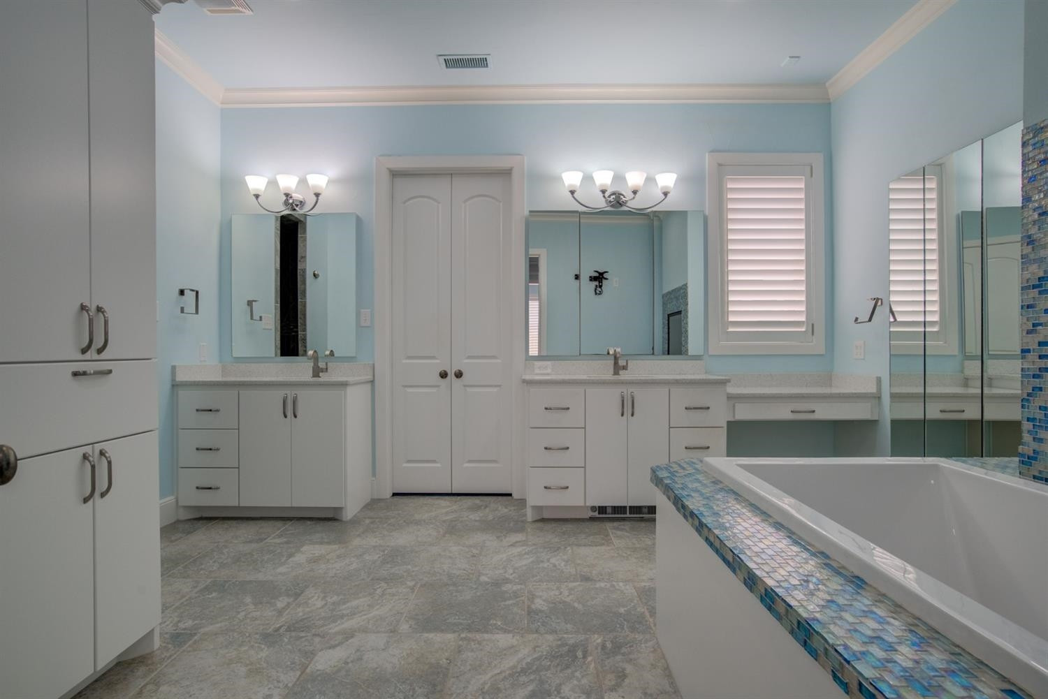4002 113th Street Lubbock, TX 79423 - Photo 24 of 50 a bathroom with a granite countertop sink tub and mirror