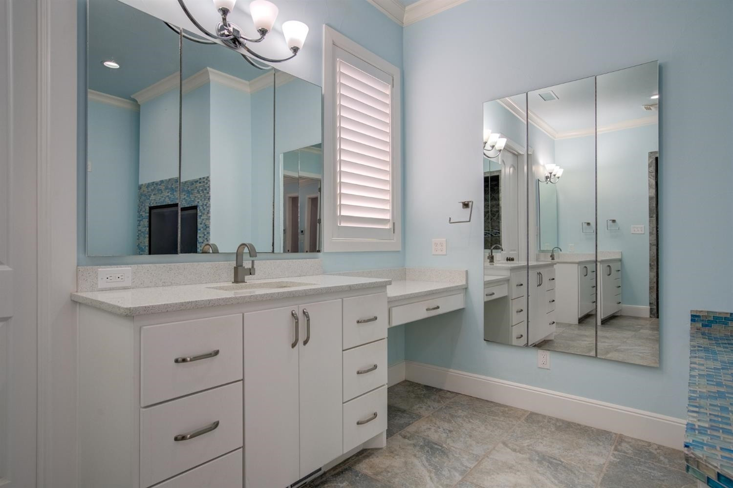 4002 113th Street Lubbock, TX 79423 - Photo 26 of 50 a bathroom with a double vanity sink mirror and shower