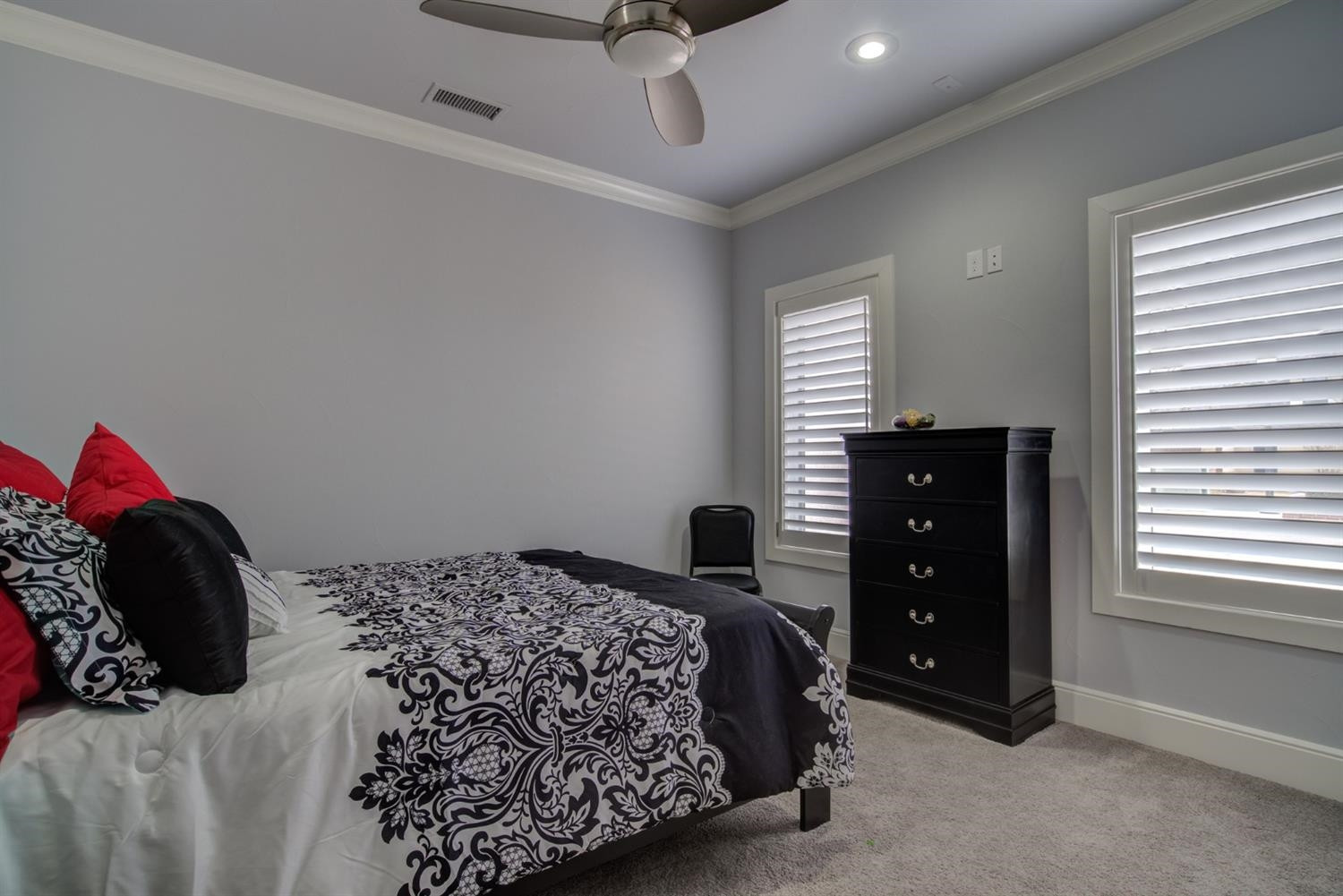 4002 113th Street Lubbock, TX 79423 - Photo 31 of 50 a bedroom with a bed and a window