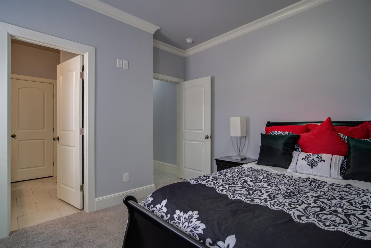 4002 113th Street Lubbock, TX 79423 - Photo 32 of 50 a bedroom with a bed and wooden floor