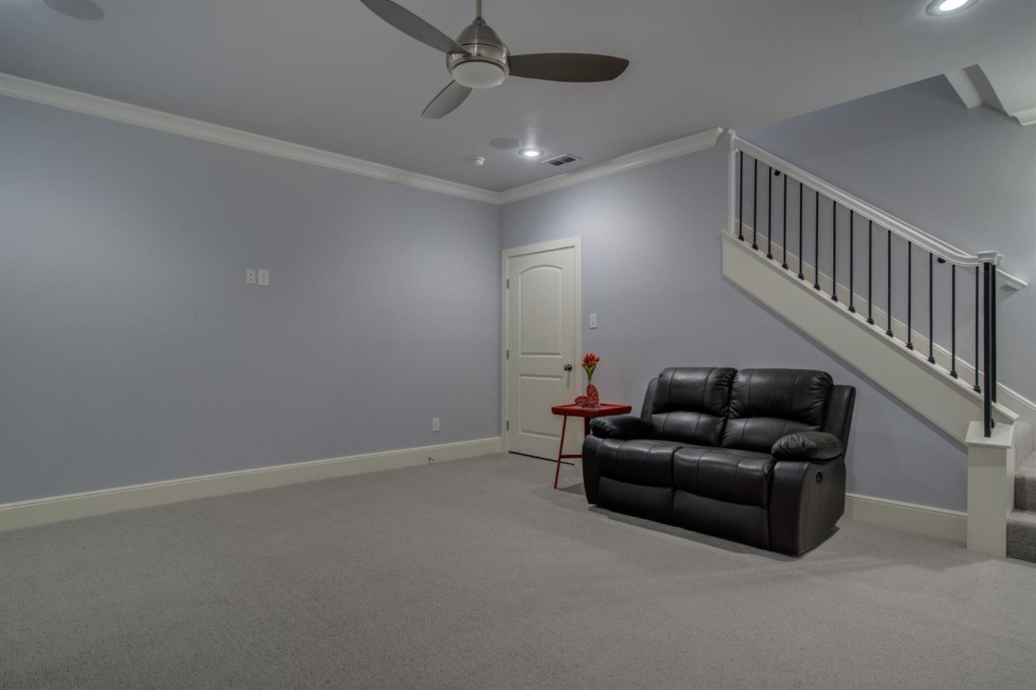 4002 113th Street Lubbock, TX 79423 - Photo 39 of 50 a living room with furniture and a chandelier