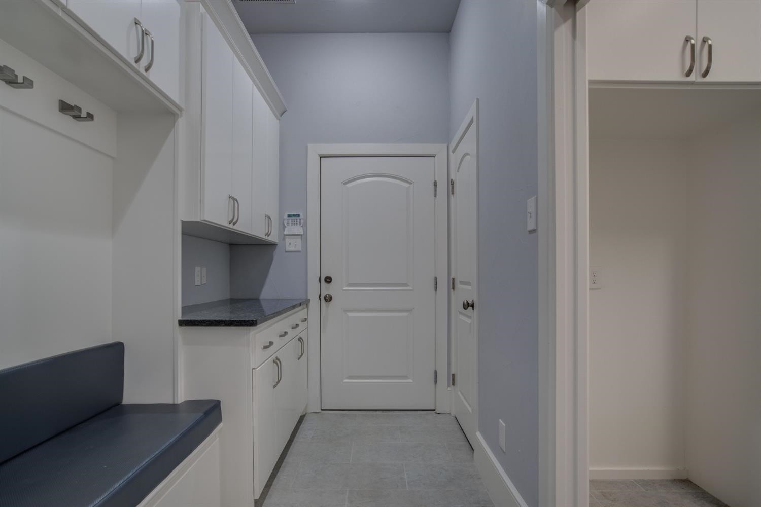 4002 113th Street Lubbock, TX 79423 - Photo 43 of 50 a kitchen with white cabinets and sink