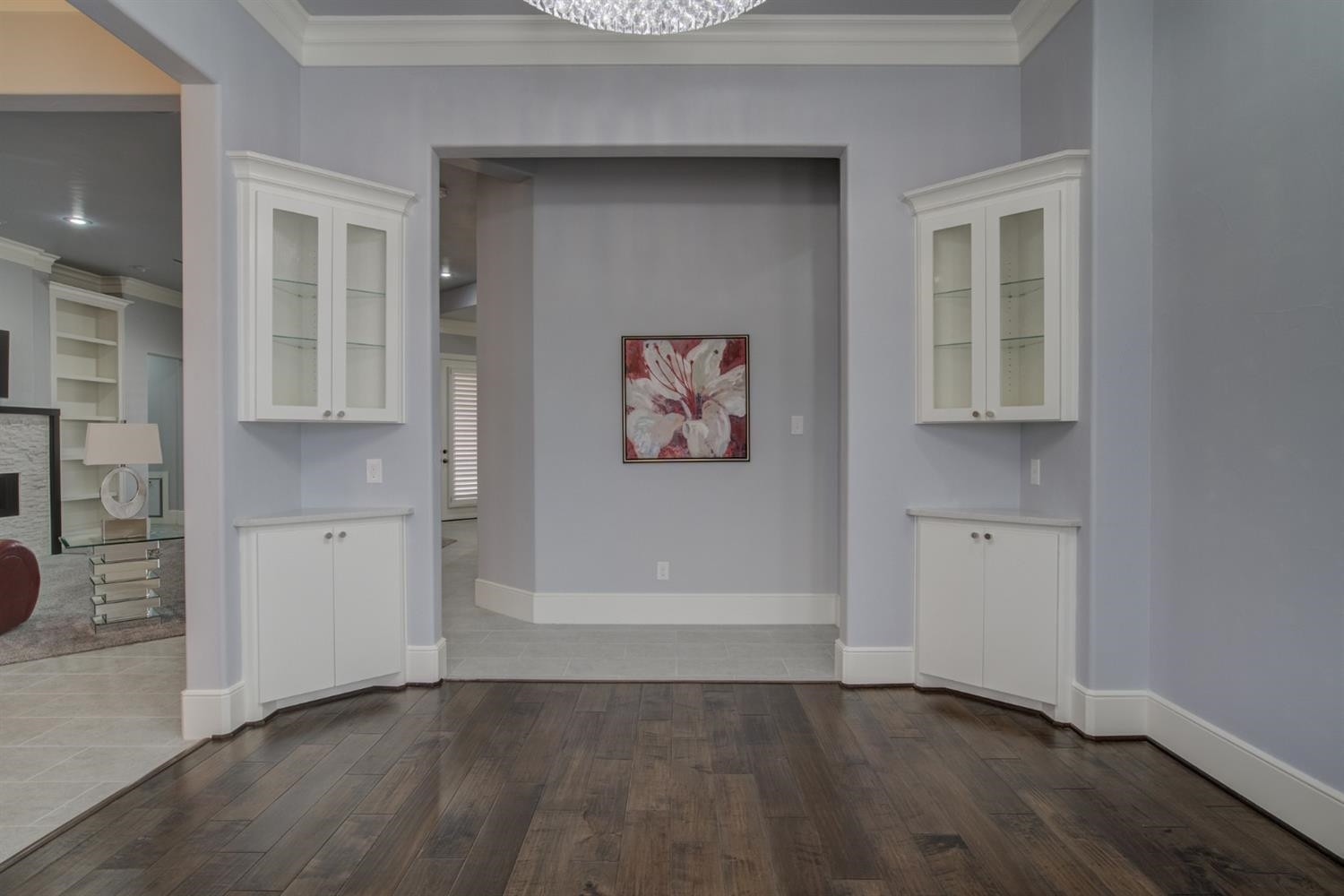 4002 113th Street Lubbock, TX 79423 - Photo 6 of 50 an empty room with wooden floor and a window