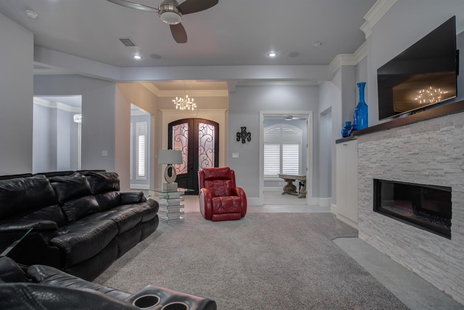 4002 113th Street Lubbock, TX 79423 - Photo 9 of 50 a living room with furniture and a fireplace