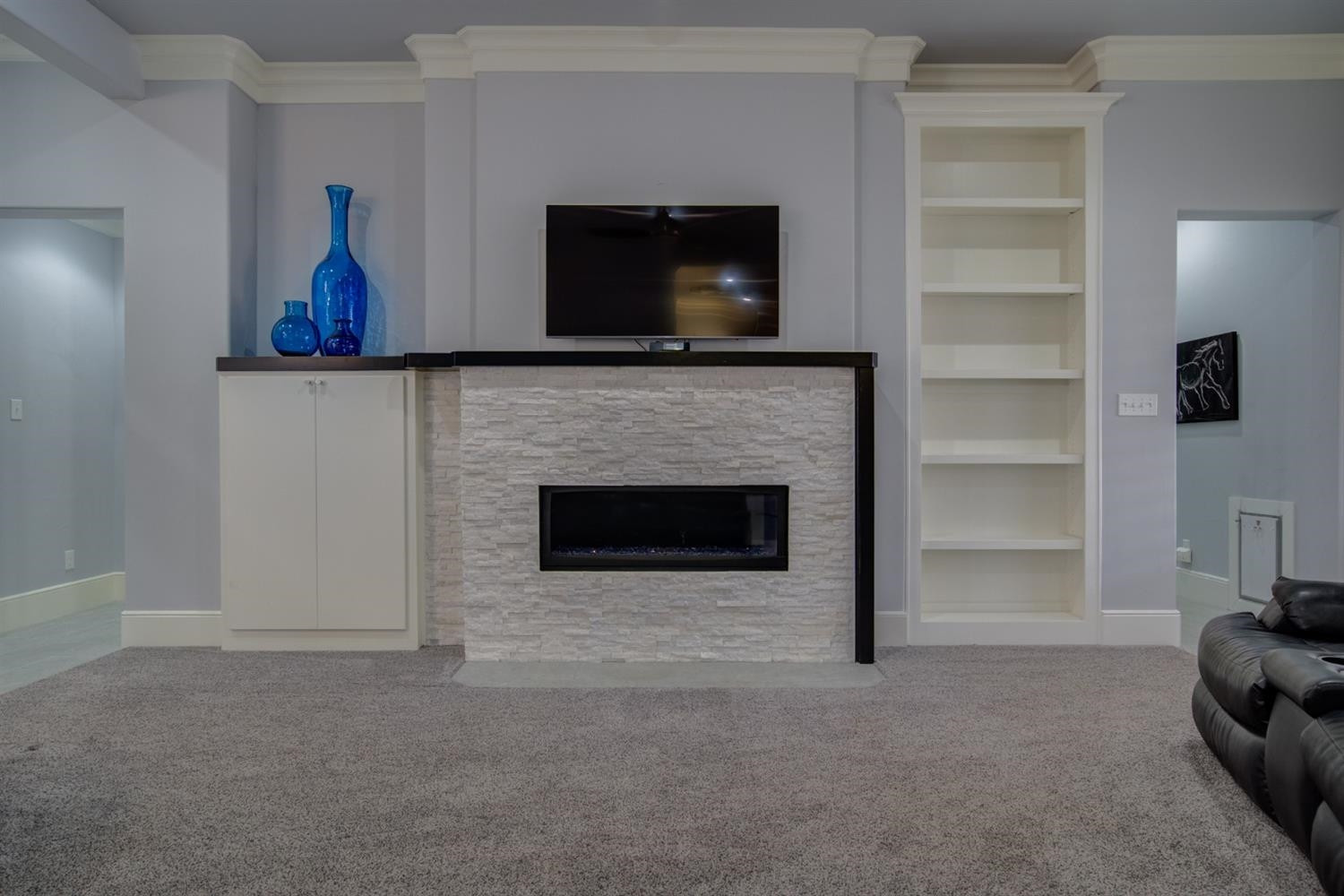 4002 113th Street Lubbock, TX 79423 - Photo 10 of 50 a living room with furniture and a fireplace