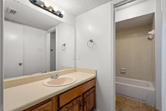 a front view of a house with a garage