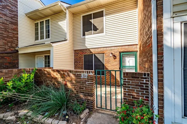 a kitchen with a stove and a microwave