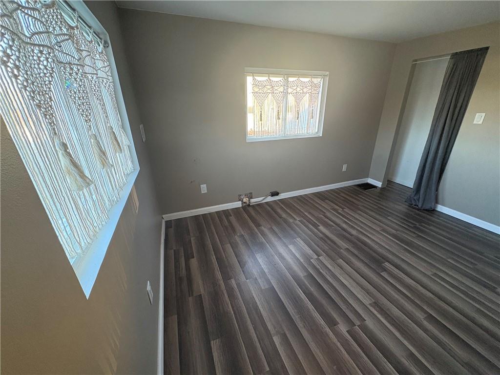5 1st Street Star Junction, PA 15482 - Photo 11 of 20 a view of an empty room with wooden floor and a window