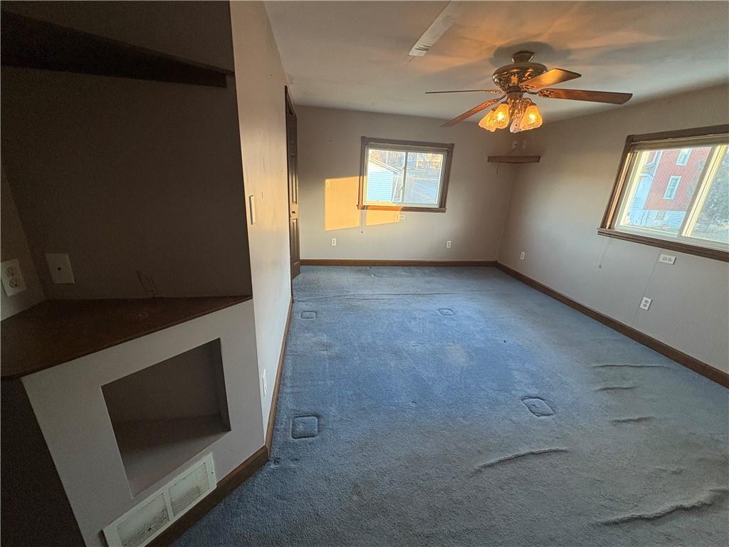 5 1st Street Star Junction, PA 15482 - Photo 16 of 20 a view of an empty room with a fireplace