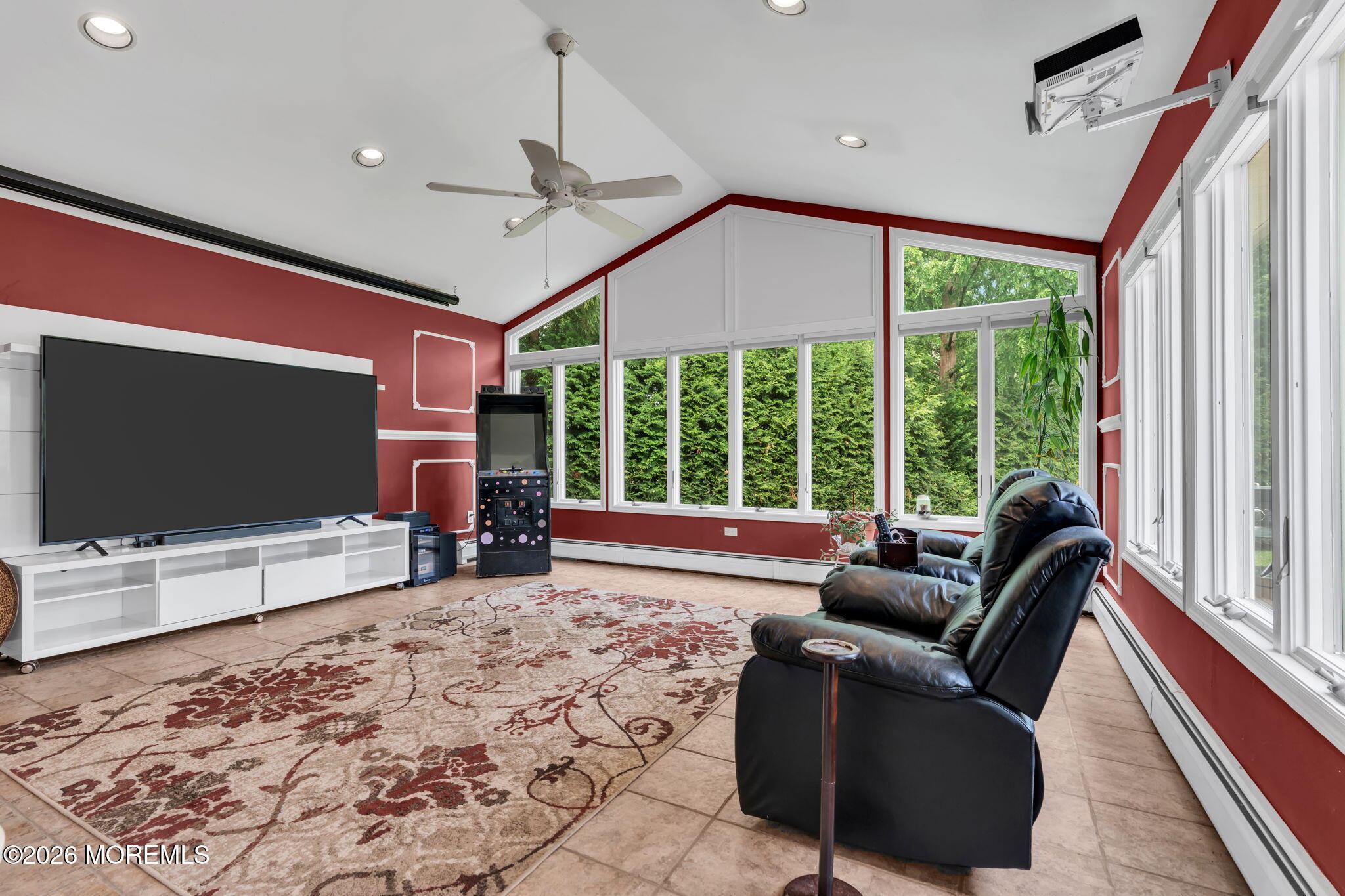 8 Owens Road Marlboro, NJ 07746 - Photo 8 of 39 a living room with furniture a flat screen tv and a large window