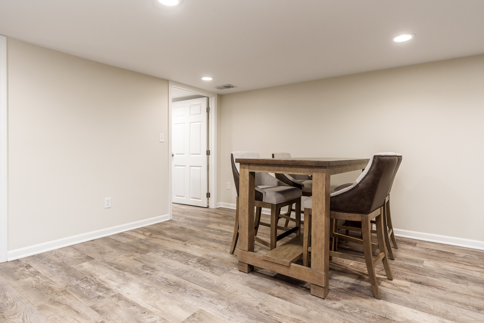 8551-8589 Rote Road Rockford, IL 61107 - Photo 56 of 89 a view of a room with furniture and wooden floor