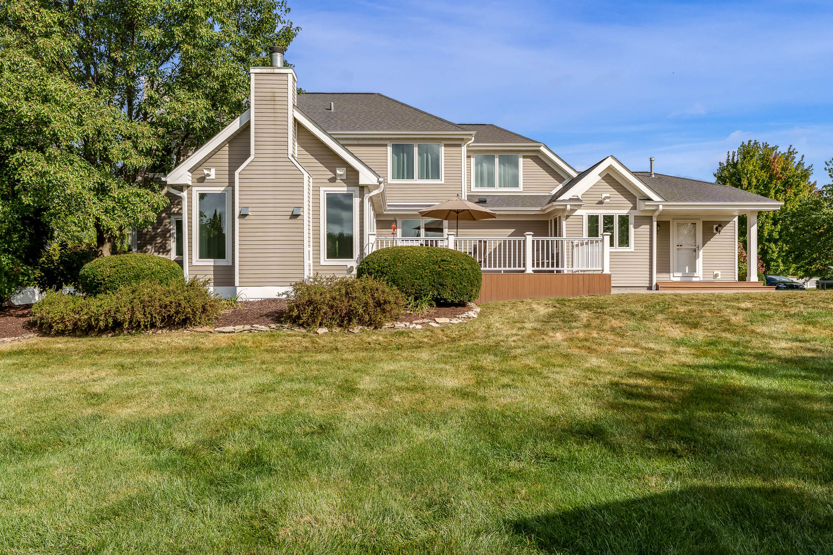 8551-8589 Rote Road Rockford, IL 61107 - Photo 67 of 89 a front view of a house with a garden