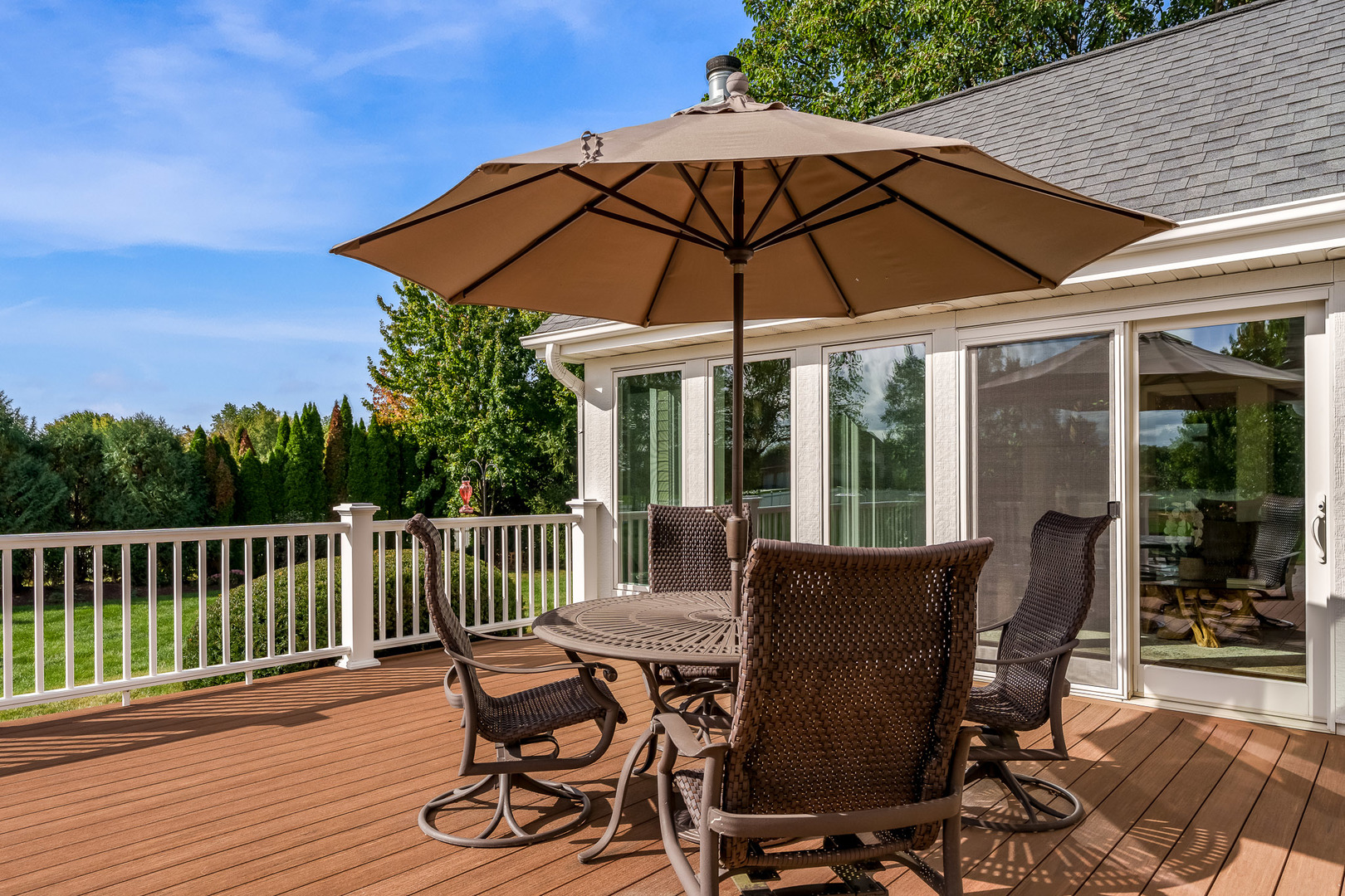 8551-8589 Rote Road Rockford, IL 61107 - Photo 69 of 89 a view of a chair and table on the deck