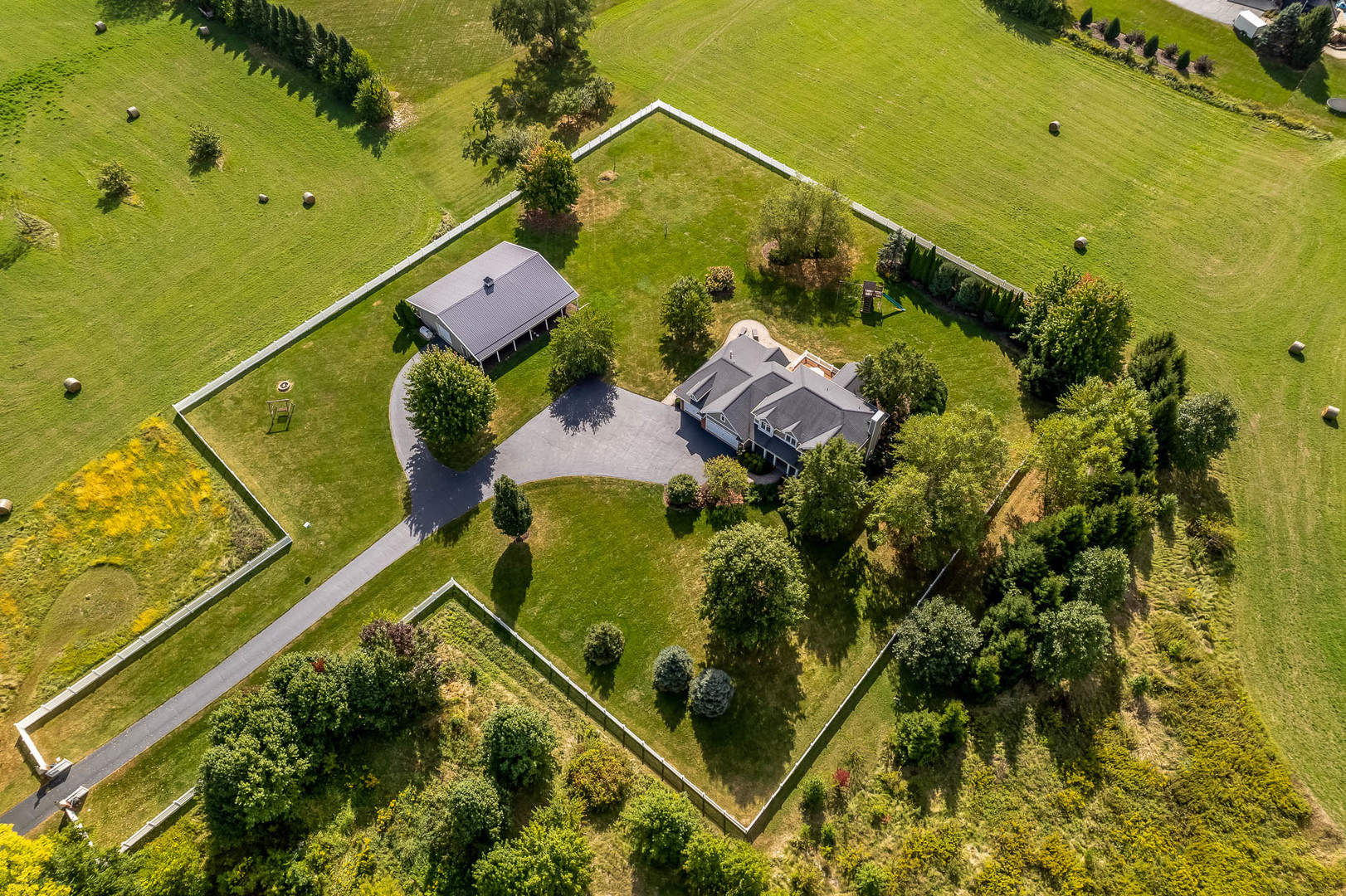 8551-8589 Rote Road Rockford, IL 61107 - Photo 85 of 89 an aerial view of a house with a garden