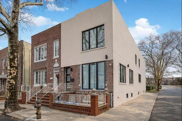 a view of multiple house with deck