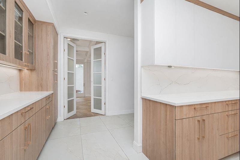 104 Village Road South Brooklyn, NY 11223 - Photo 12 of 36 a bathroom with a sink and a mirror