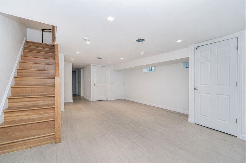 104 Village Road South Brooklyn, NY 11223 - Photo 24 of 36 a view of an empty room and stairs