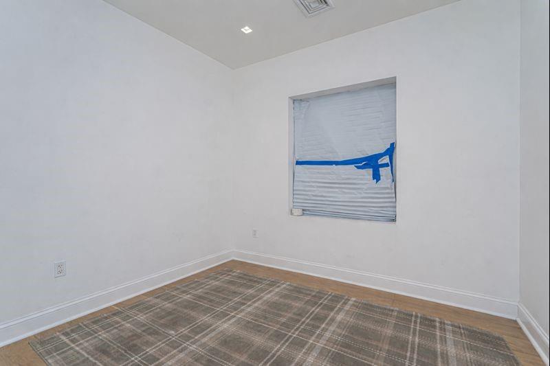 104 Village Road South Brooklyn, NY 11223 - Photo 31 of 36 a view of an empty room