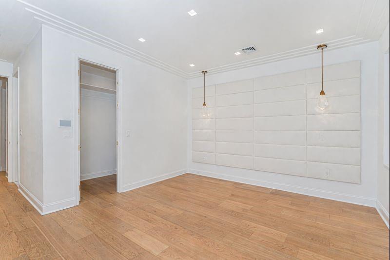 104 Village Road South Brooklyn, NY 11223 - Photo 34 of 36 a view of empty room with a fan