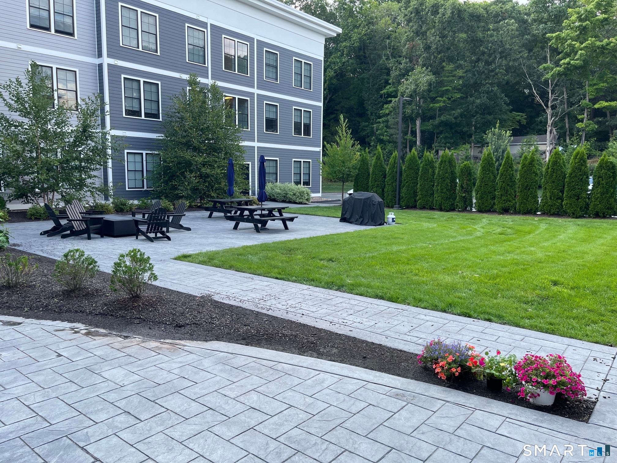 33 Old Tavern Road Orange, CT 06477 - Photo 8 of 28 Center courtyard in rear with propane fire pits