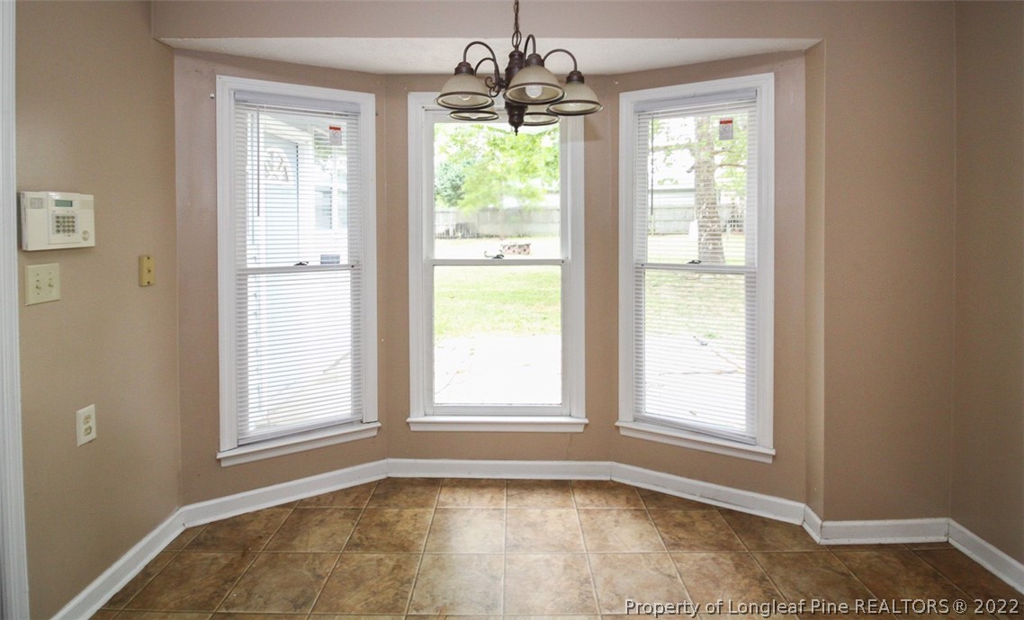 220 Overton Road Raeford, NC 28376 - Photo 12 of 30 a view of an empty room with a window