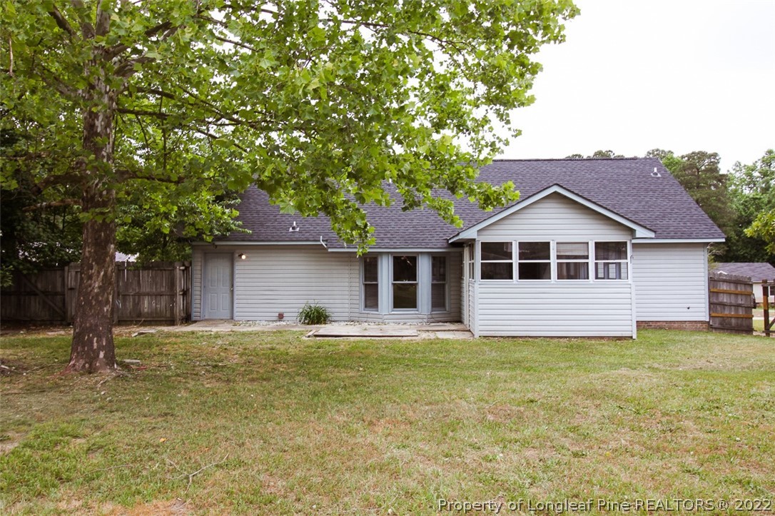 220 Overton Road Raeford, NC 28376 - Photo 28 of 30 a house that has a tree in front of it