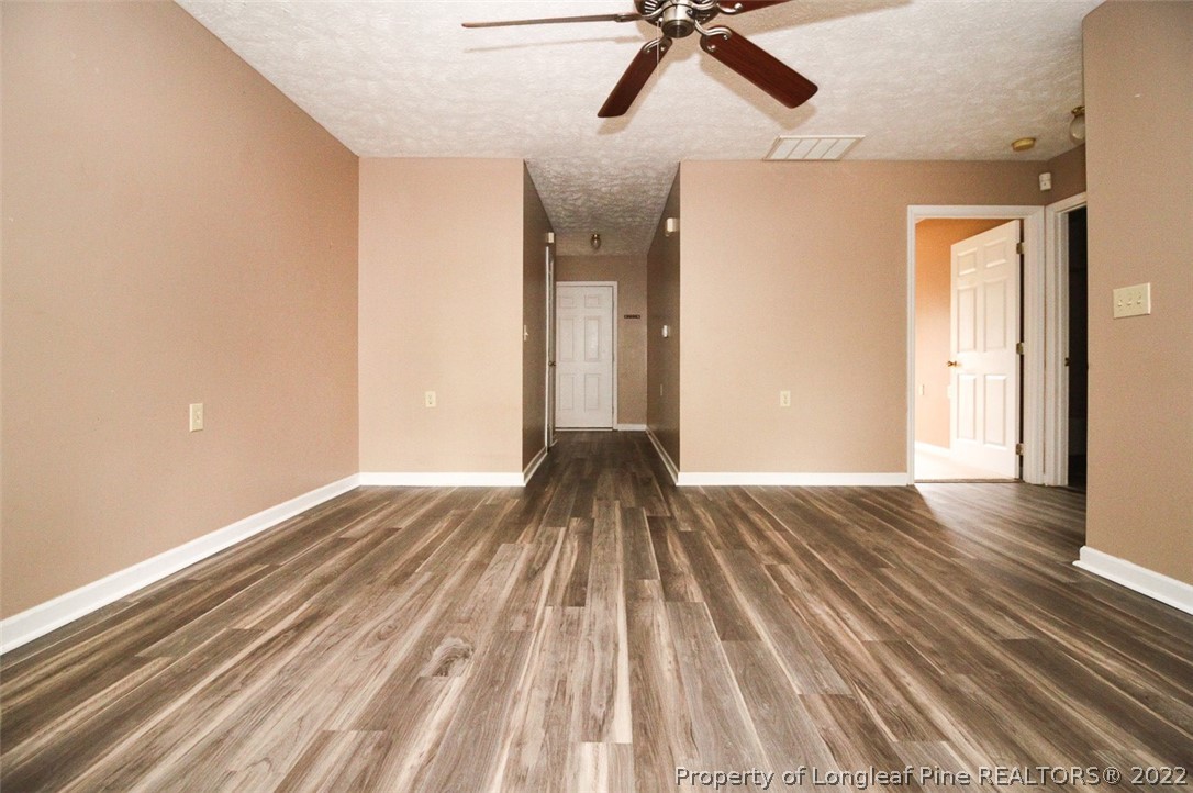 220 Overton Road Raeford, NC 28376 - Photo 3 of 30 a view of empty room with wooden floor