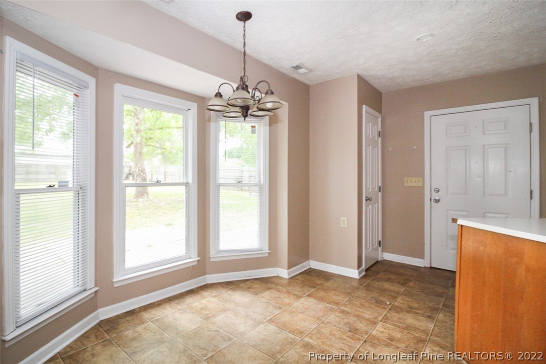 220 Overton Road Raeford, NC 28376 - Photo 9 of 30 a view of an empty room with a window