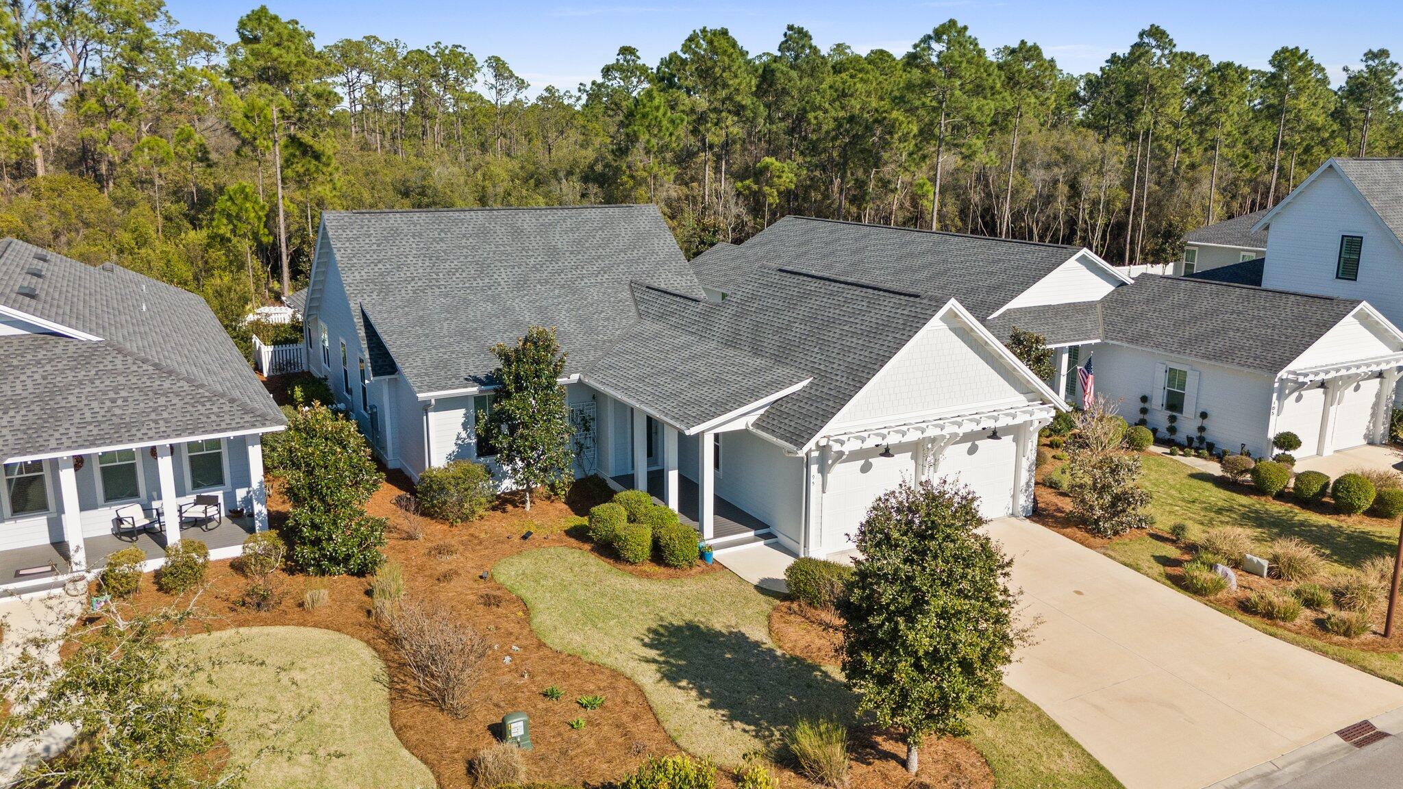 95 Log Landing St Inlet Beach Inlet Beach, FL 32461 - Photo 1 of 59 a aerial view of a house with a yard