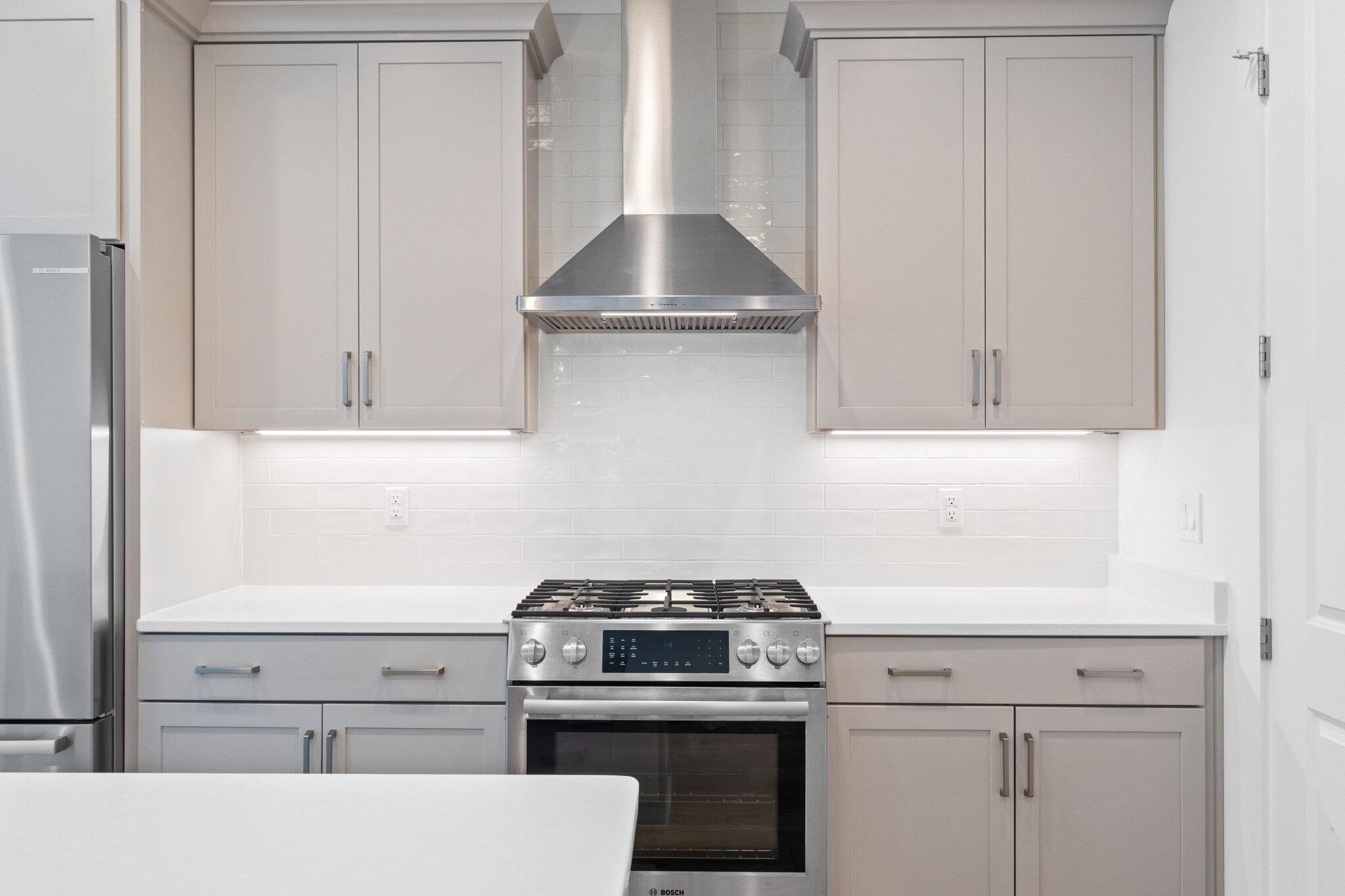 95 Log Landing St Inlet Beach Inlet Beach, FL 32461 - Photo 12 of 59 a stove top oven sitting inside of a kitchen