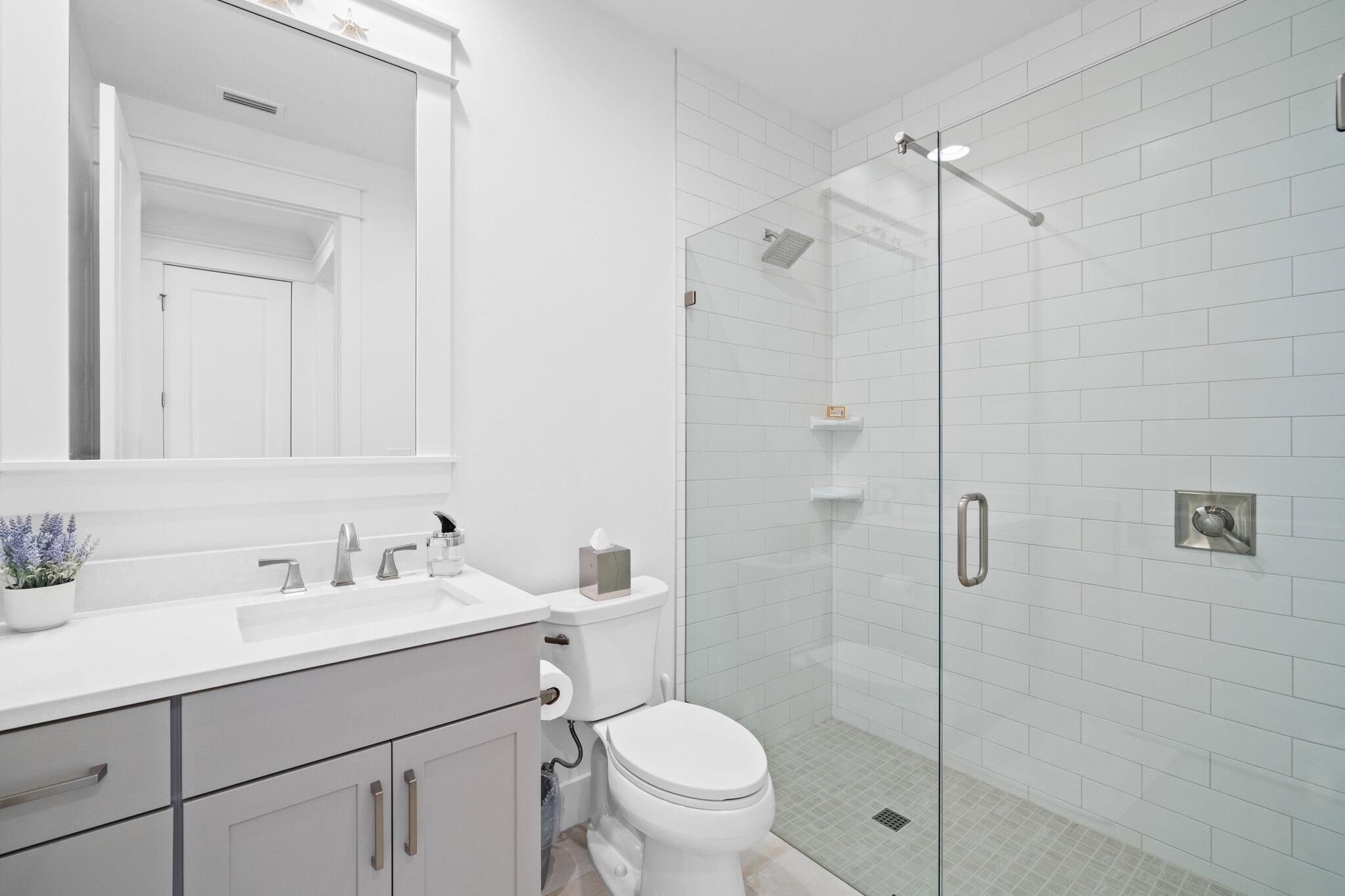 95 Log Landing St Inlet Beach Inlet Beach, FL 32461 - Photo 23 of 59 a bathroom with a sink toilet vanity and shower