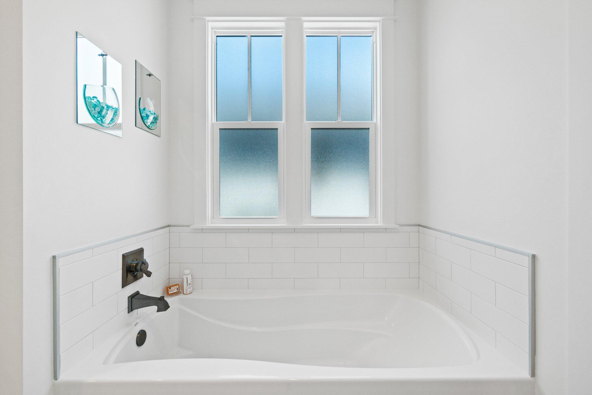95 Log Landing St Inlet Beach Inlet Beach, FL 32461 - Photo 36 of 59 a white bath tub sitting in a bathroom