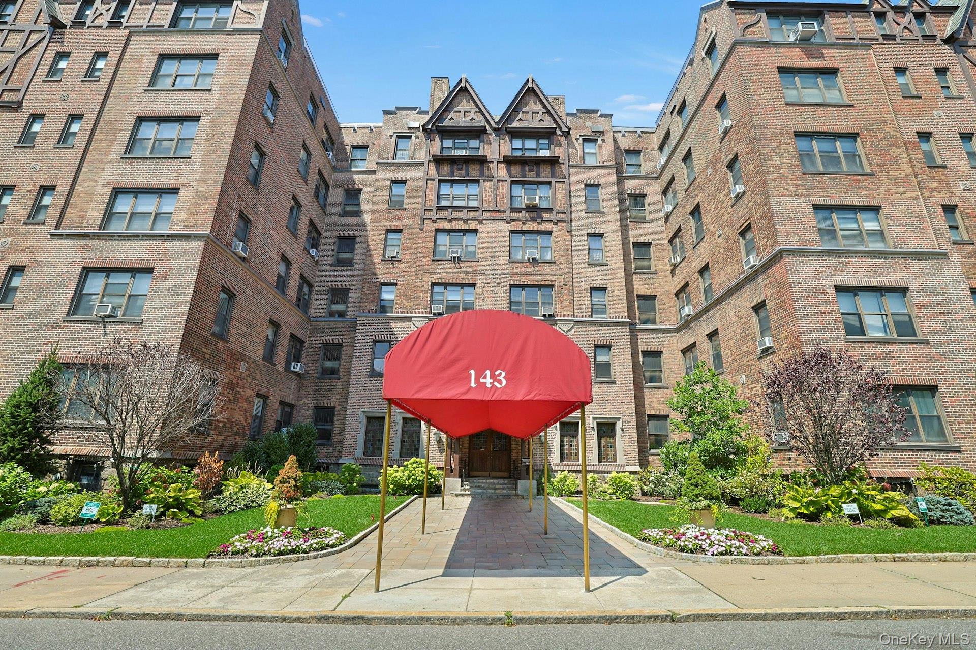 143 Garth Road, Unit 5B Scarsdale, NY 10583 - Photo 1 of 1 front view of a building