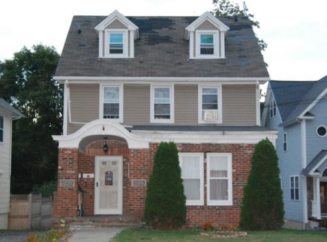 227 Flax Hill Road Norwalk, CT 06854 - Photo 1 of 1 a front view of a house with a yard