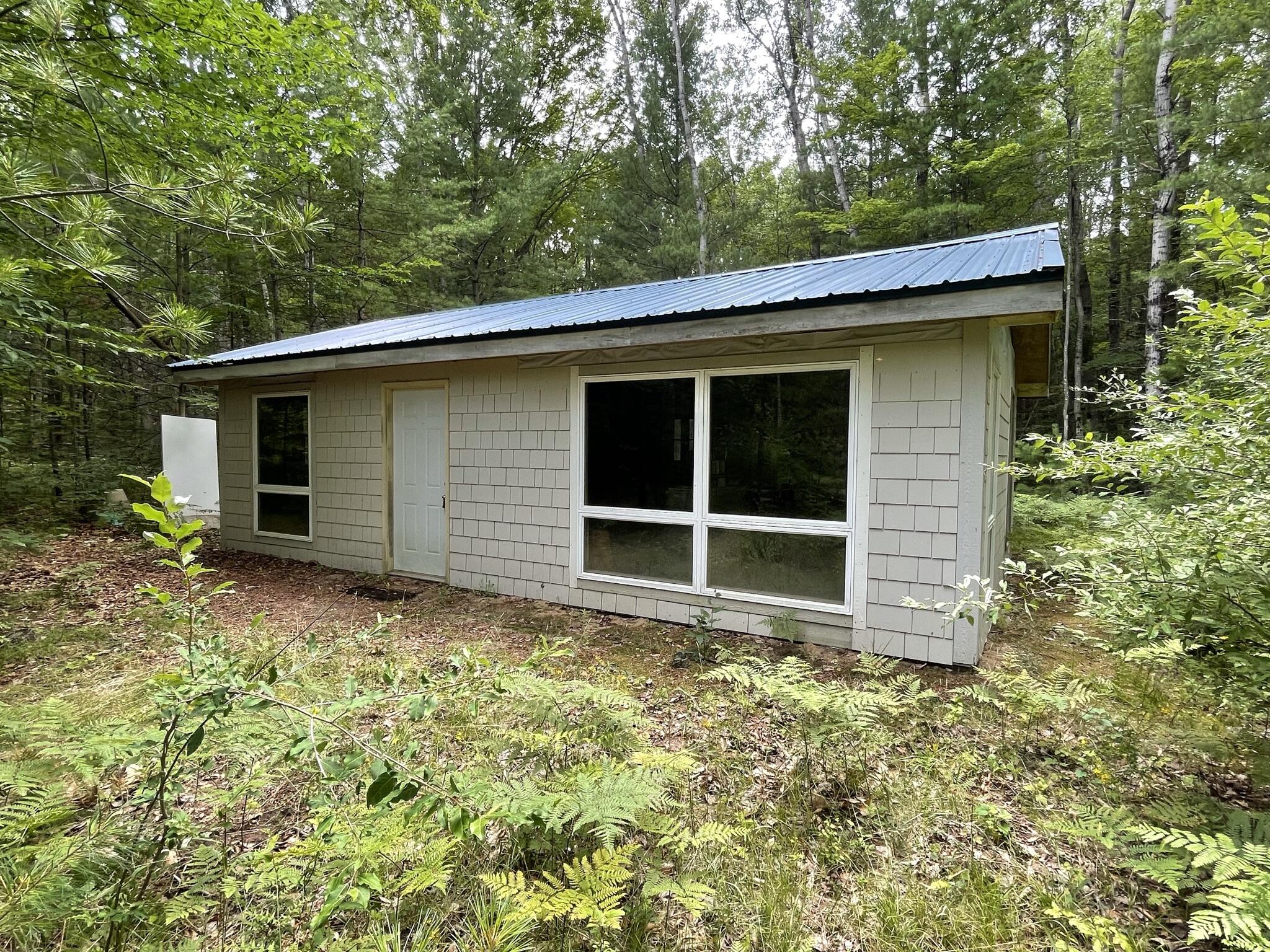 10081 East 5 Mile Road Luther, MI 49656 - Photo 2 of 22 IMG_8461