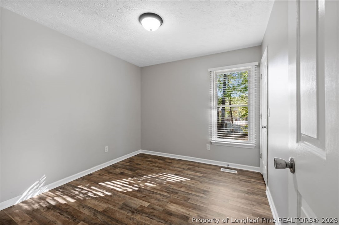 1205 Crossbend Court Fayetteville, NC 28314 - Photo 19 of 37 an empty room with a window