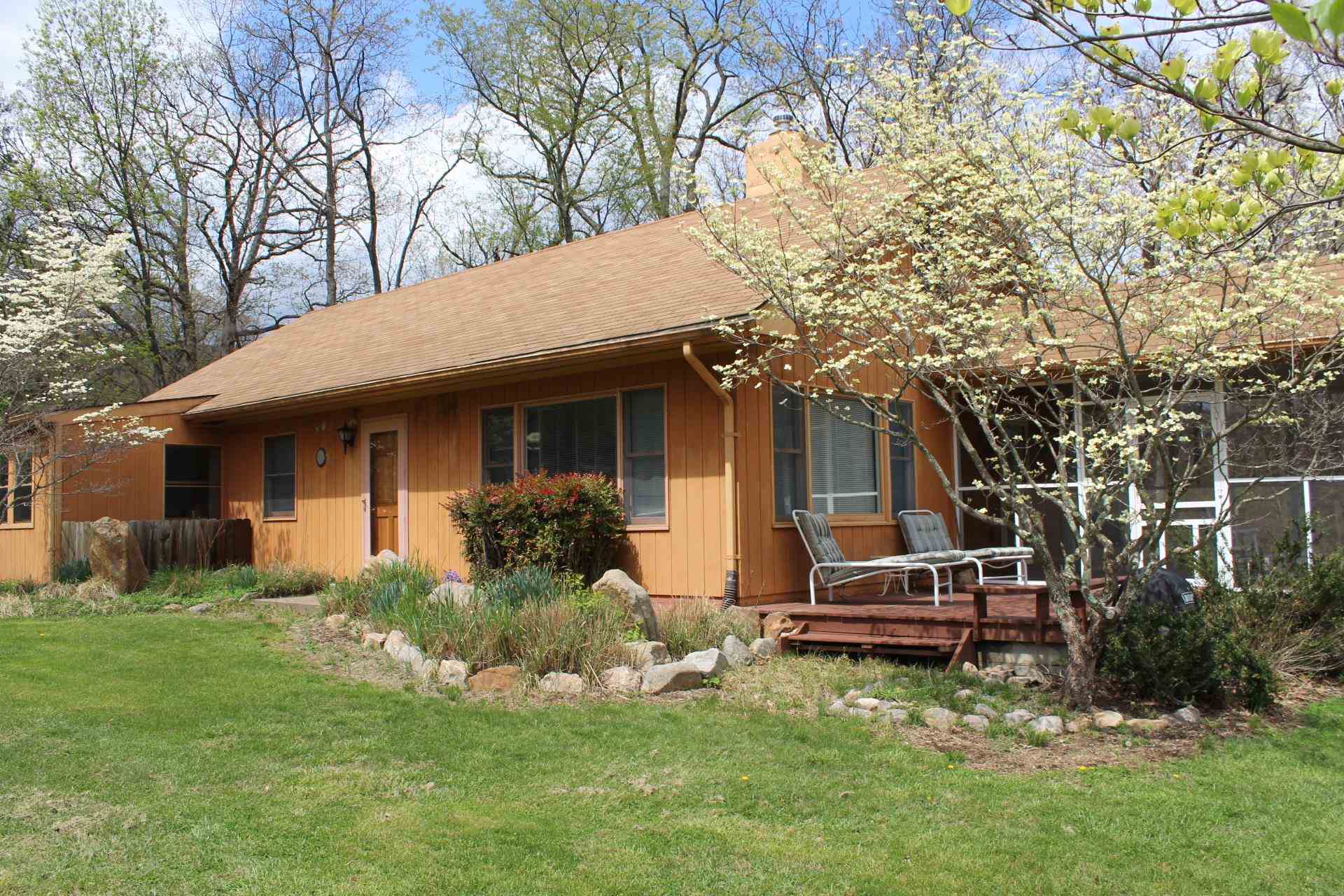 1076 Fort Valley Road Fort Valley, VA 22652 - Photo 2 of 54 a view of a house with a yard porch and sitting area