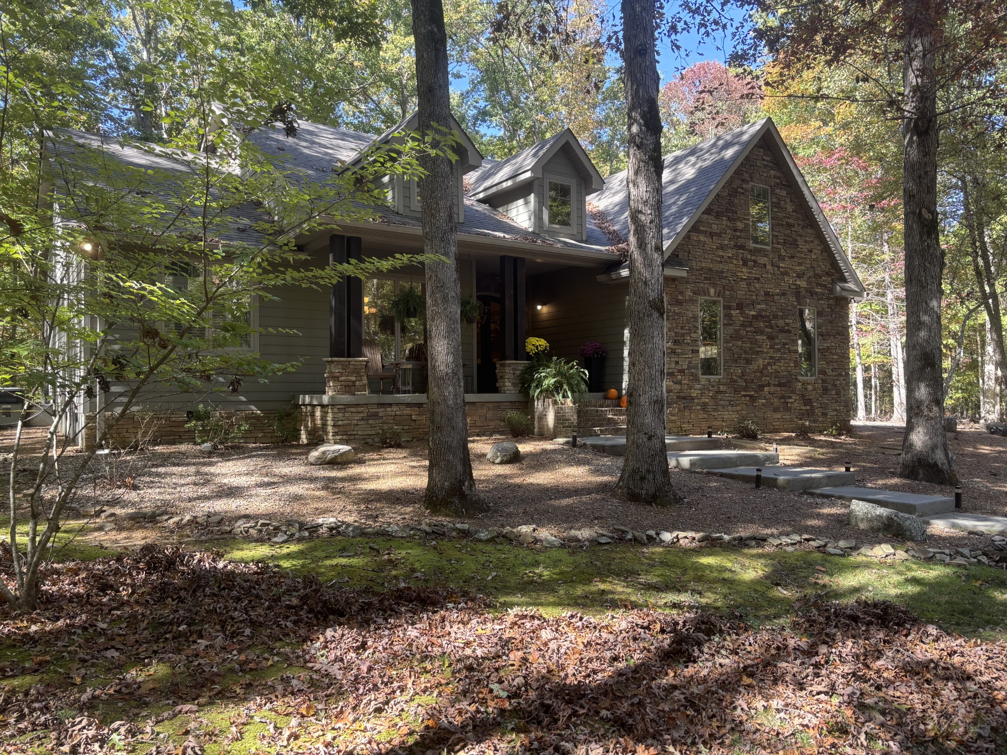 2271 Timberwood Trace Monteagle, TN 37356 - Photo 2 of 22 a view of a house with a yard and tree s